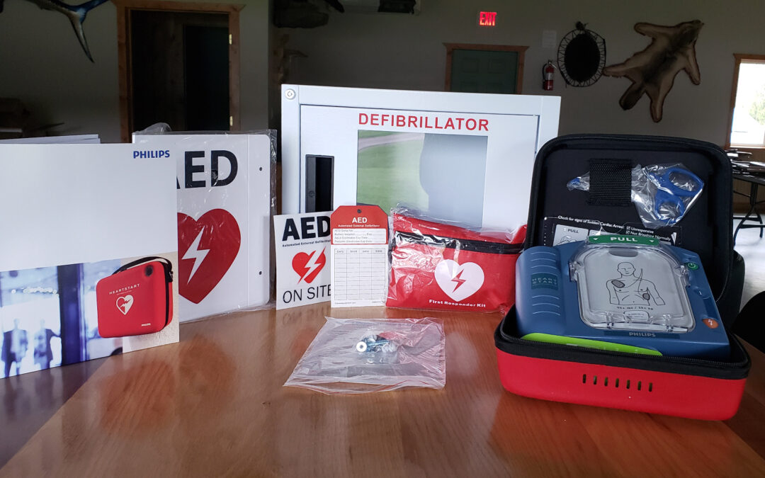 AMI Silica Donates Life-Saving AED Device to North Branch Humbird Rod & Gun Club
